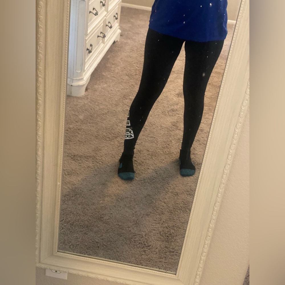 Victoria’s Secret pink yoga pants with cheetah logo